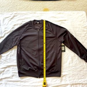 Mitre men’s large zip up to pocket jacket.
